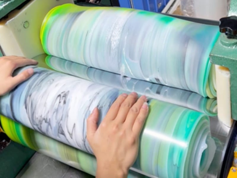 Multi-color silicone sheet processing for custom silicone mat manufacturing and material control
