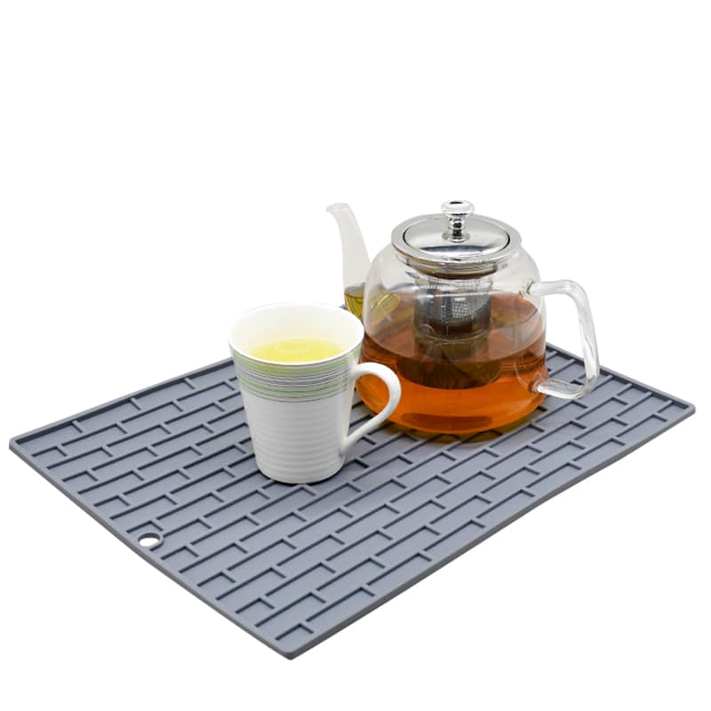 Textured silicone dish drying mat with drainage grooves for kitchen and countertop use