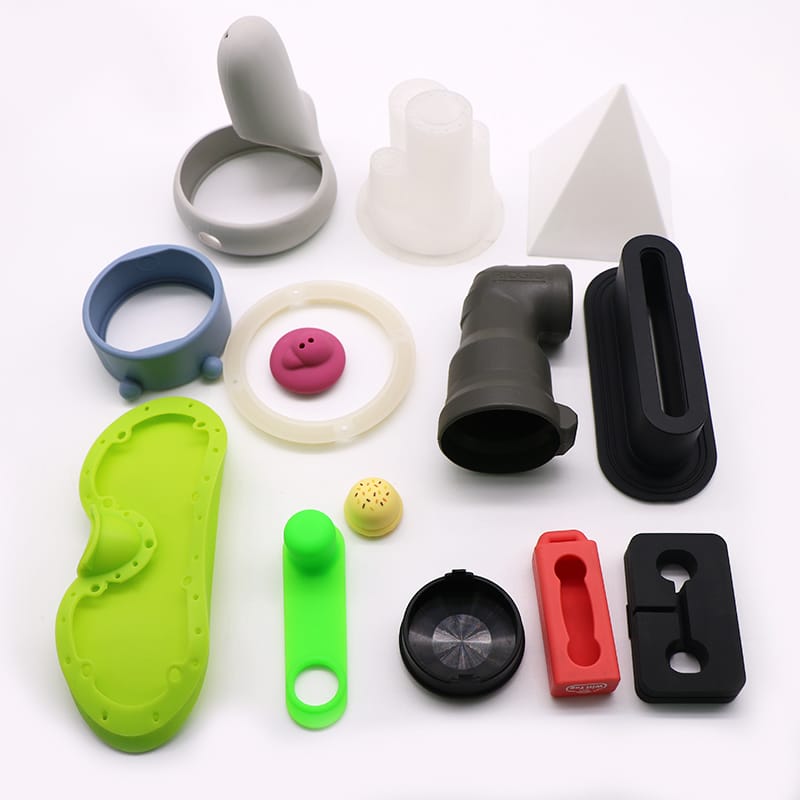 Assorted molded silicone components highlighting functional surface textures