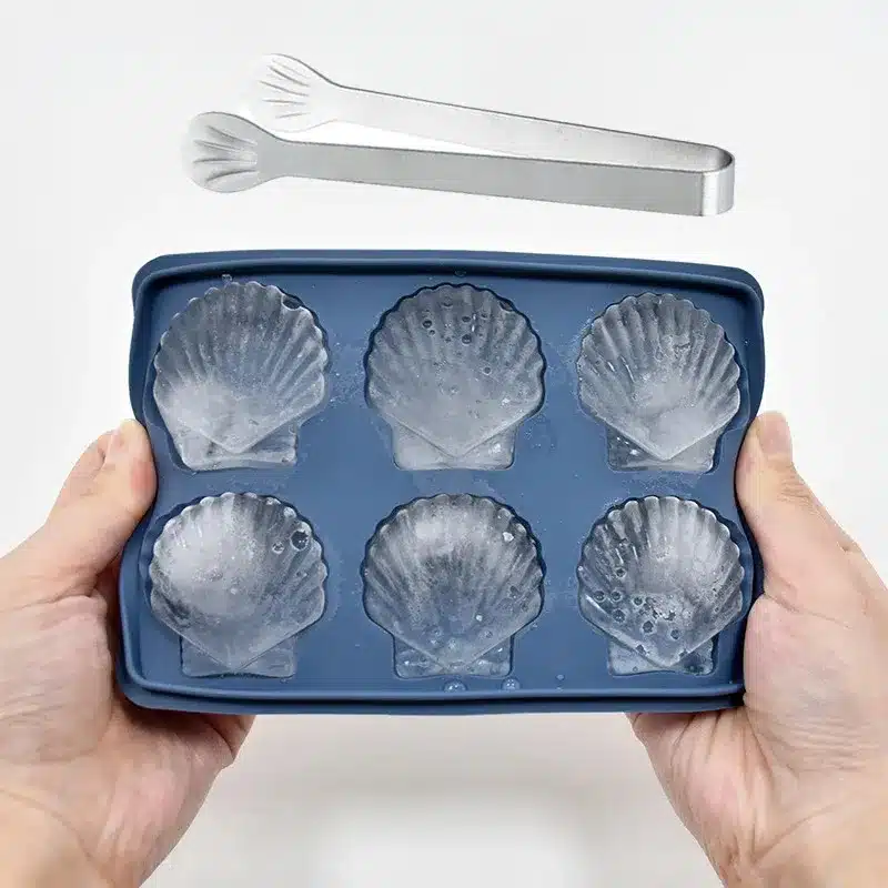 Custom silicone novelty ice cube tray with shell shaped cavities for cocktails beverages and frozen desserts