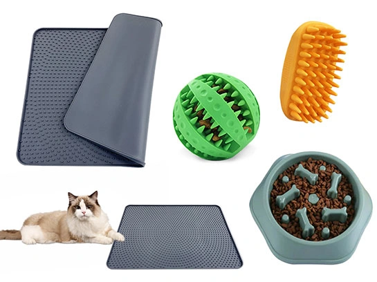 Silicone pet feeding mat, treat ball, grooming brush, and pet bowl designed for daily use