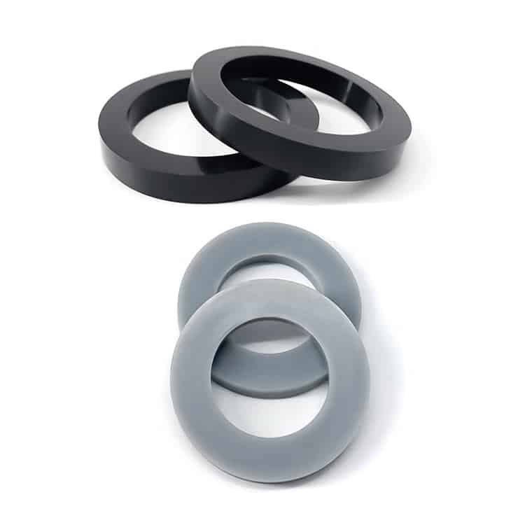 High-precision black and gray silicone rings, demonstrating durability and thermal stability for custom seal solutions