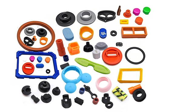 Various molded silicone parts including plugs, bushings, seals, and protective components