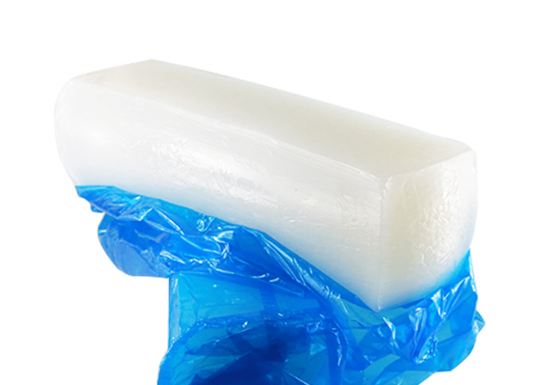 White silicone block wrapped in protective film, ready for extrusion or custom seal manufacturing