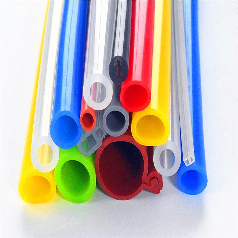 Colored silicone tubes and sleeve profiles with opaque and translucent effects