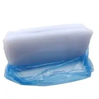 Stack of raw silicone sheets ready for molding into custom products