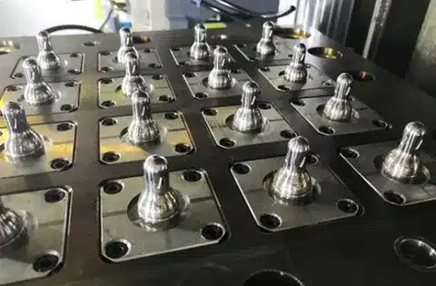 Close-up of precision multi-cavity silicone mold for custom component production