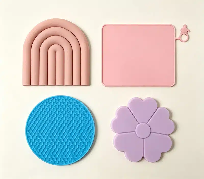 Custom silicone mats with tailored sizes and printed logos for branding