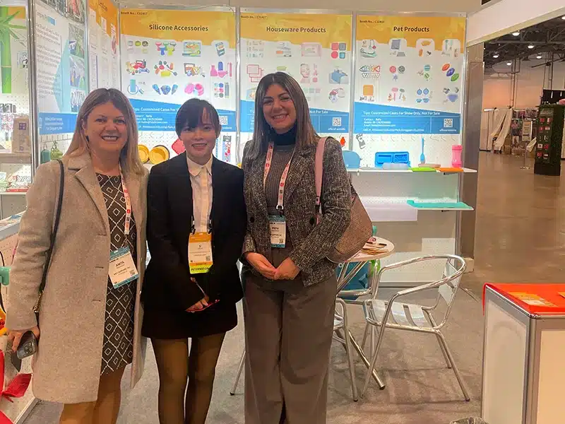 Balle Zhong at a silicone industry trade show, connecting with customers and presenting custom silicone product solutions