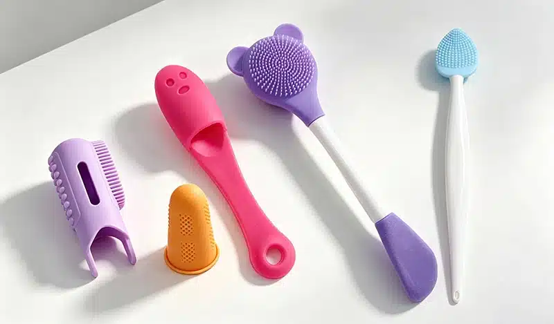 Silicone personal care and beauty tools including brushes, scrubbers, and soft tips